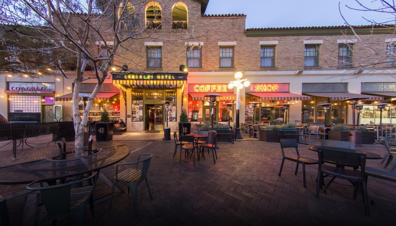 Hotel Congress courtyard with outdoor tables and evening lights